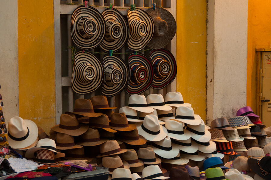 A picture of hats for sale in a Colombian street.